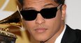 Bruno Mars with his Grammy Award