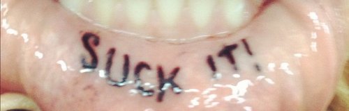 Ke$ha shows off lip tattoo