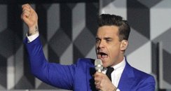 Robbie Williams live on satge at the BRIT Awards 2