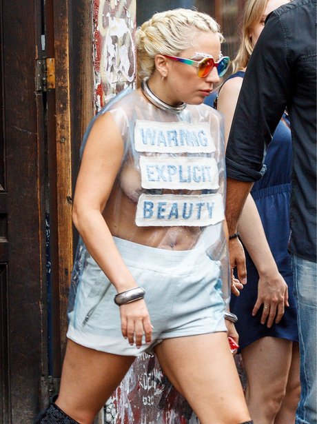 Lady Gaga wearing a see through slogan top